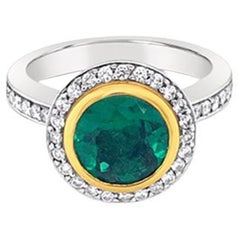 Platinum and 18ct Yellow Gold Emerald and Diamond 'grace' Ring