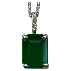 GIA Certified 1.50ct Untreated Emerald 18k White Gold Diamond Surround Pendant
