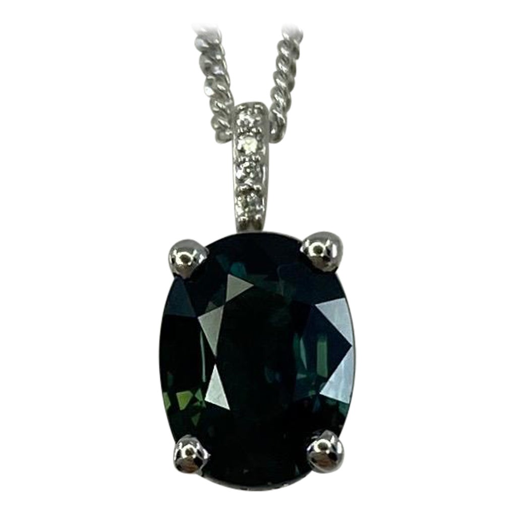 1.70ct Deep Green Blue Sapphire Oval 18k Gold Diamond Surround Pendant Necklace For Sale