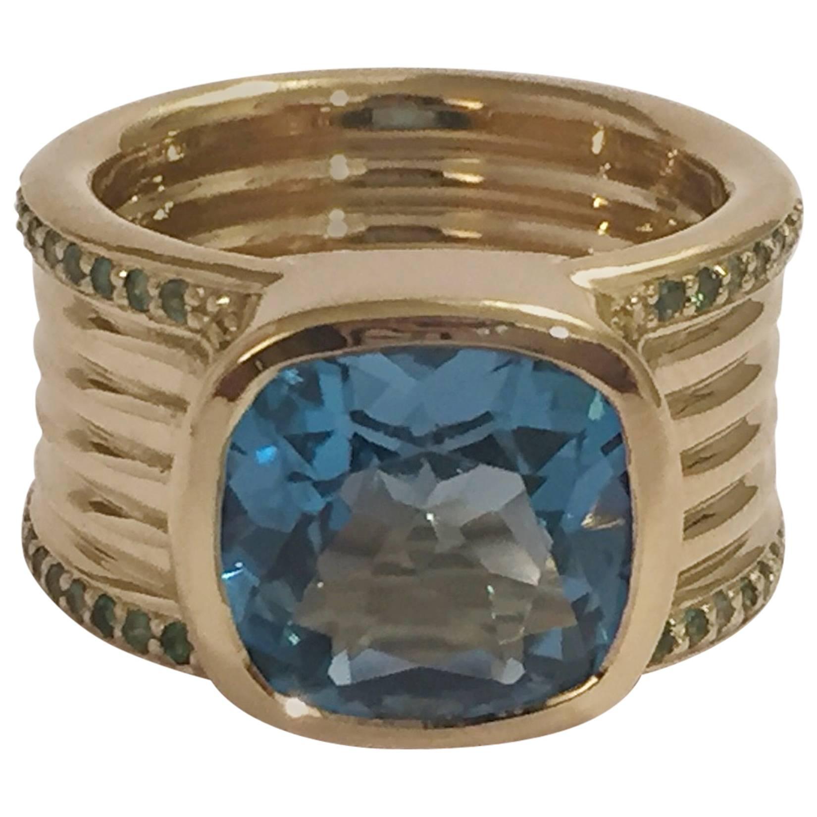 Blue Topaz Green Garnet Gold Cigar Band Ring  For Sale