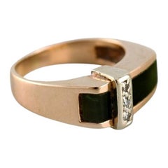 Bijoutier danois:: Bague en or 14 carats avec tourmaline verte et trois diamants
