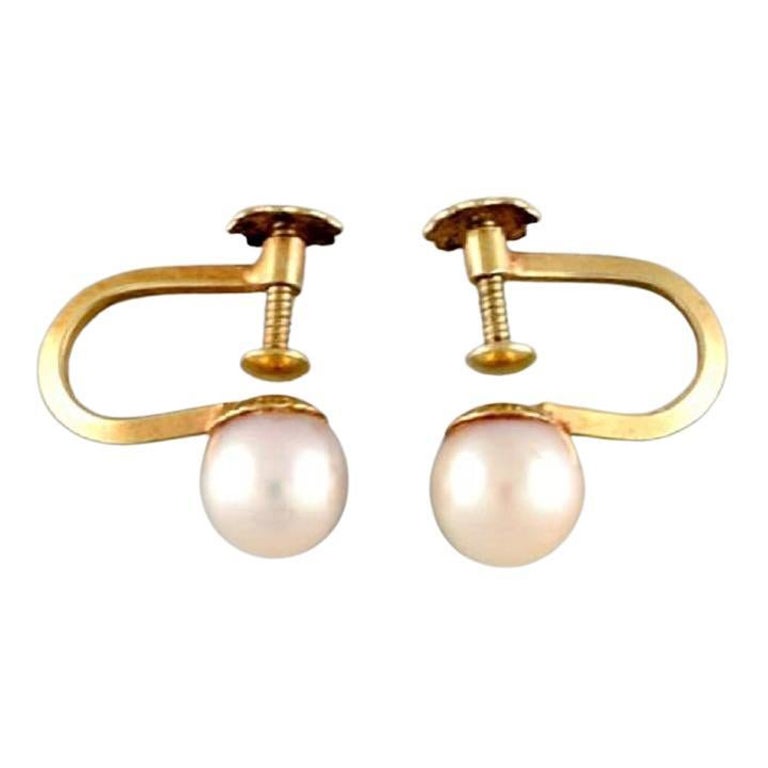 Scandinavian Jeweler, a Pair of Classic Earrings in 14 Carat Gold For Sale