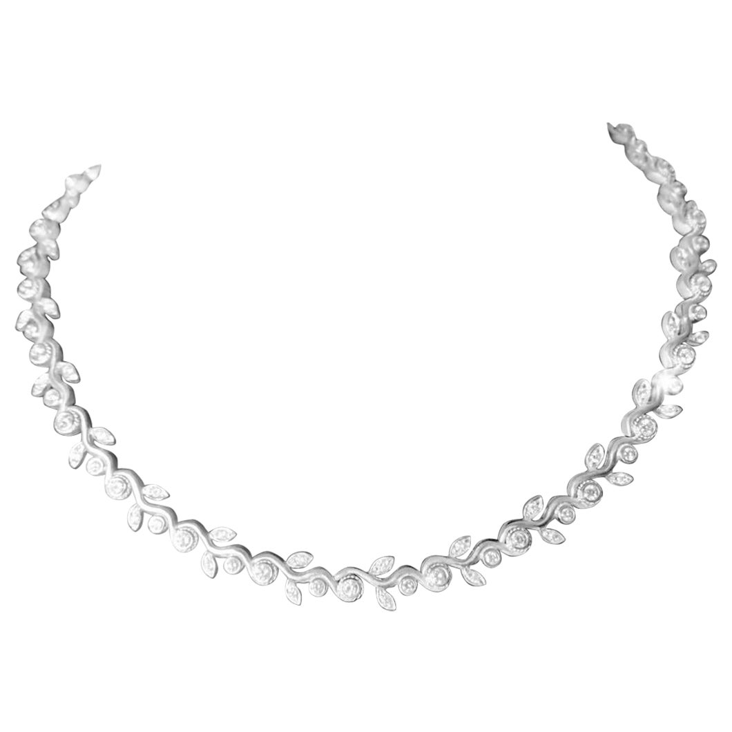 Be ready for compliments while wearing this Penny Preville eternity leaf platinum and diamond choker.  This classic choker screams elegance and sophistication.  There are three cttw VS-SI clarity diamonds, G-H in color and thirty three grams of