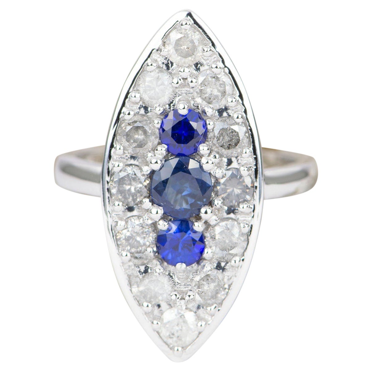 Bague navette d'inspiration vintage en or blanc 14 carats avec saphir bleu et halo de diamants