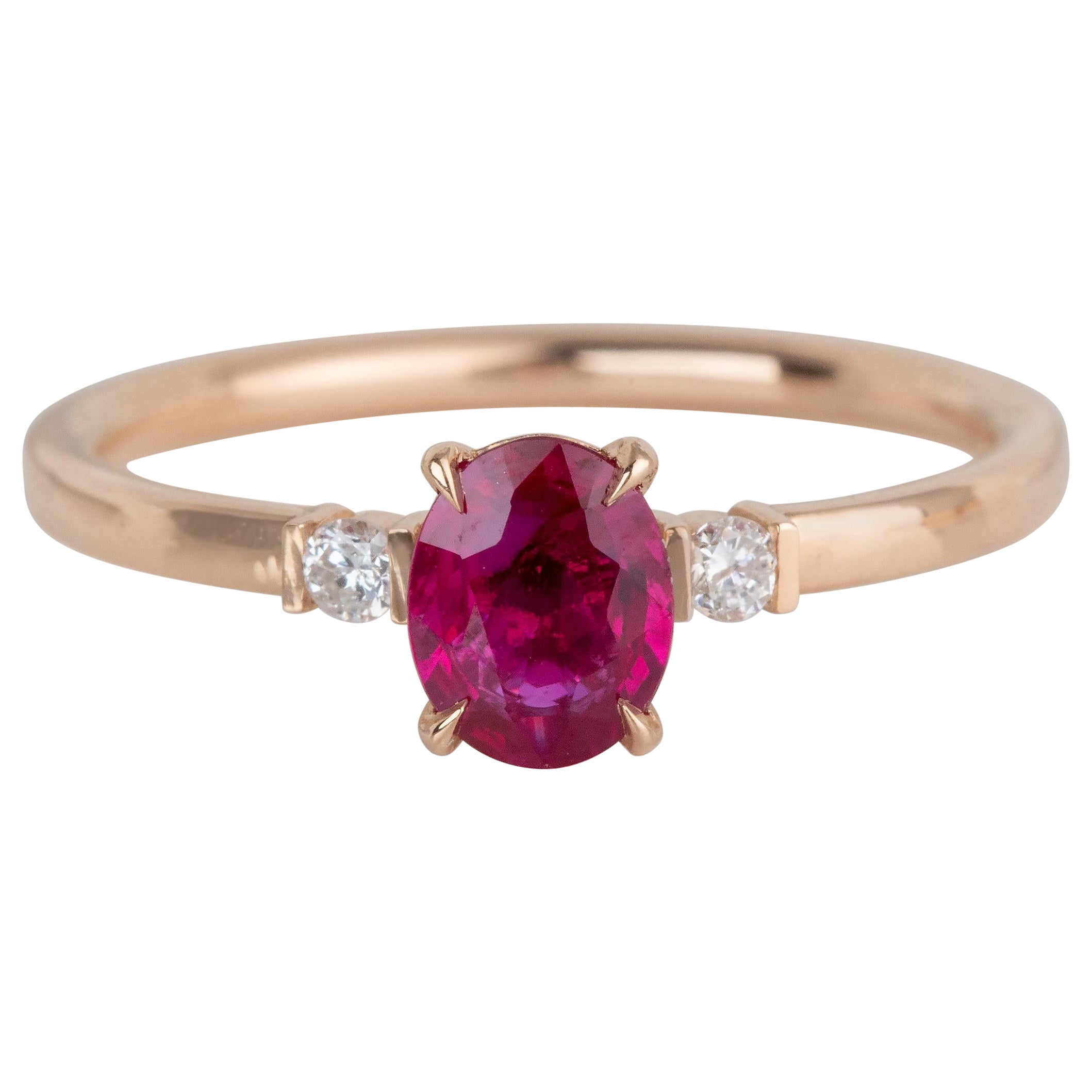 Or rose 14 carats 0,80 carat Bague ovale en rubis et diamants