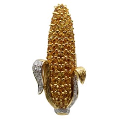 A Vintage 11.10 Carat Yellow Sapphire & Diamond Corn Brooch