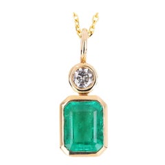 1.58tcw 14K Colombian Emerald-Emerald Cut & Diamond Pendant