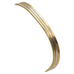 Bracciale a catena a tre colori in oro bianco, giallo e rosa.