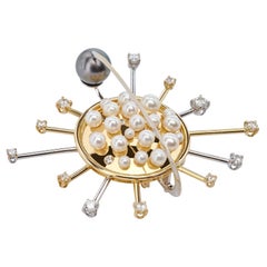 Collier brochure rond de forme planétaire rayonnante en or 18 carats avec perles et diamants
