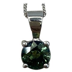 Pendentif rond en or blanc 18 carats, saphir bleu vert non traité de 0,75 carat