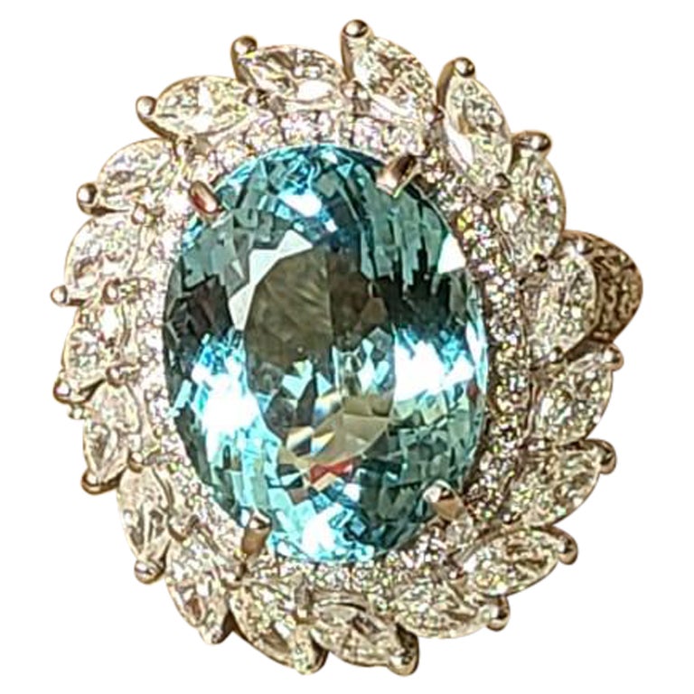 Set in 18K Gold, 8.56 Carats, Oval Aquamarine & Marquise Diamonds Cocktail Ring