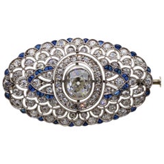A 4.80 Platinum Carat Filigree Old European & Old Miner Art Deco Sapphire Brooch