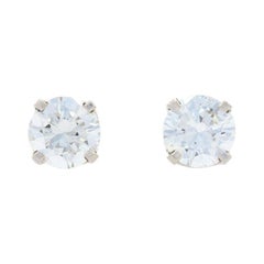 Clous d'oreilles en or blanc 14 carats avec diamants taille brillant rond de 0,76 carat, percés