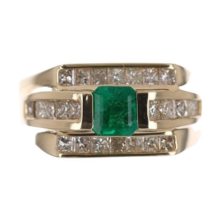 Setting Style: Tension - Bezel
Setting Material: 14K Yellow Gold
Gold Weight: 8.6 Grams

Main Stone: Emerald
Shape: Emerald Cut
Weight: 0.80-Carats
Clarity: Transparent
Color: Vivid Green
Luster: Excellent - Very Good
Origin: Colombia
Treatments:
