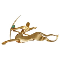 Trabert & Hoeffer Mauboussin Yellow Gold Turquoise Sagittarius Brooch