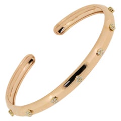 Bracciale aperto con diamanti artigianali in oro giallo e rosa 18K con finitura fiorentina