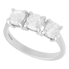 Antique and Contemporary 1.73 Carat Diamond and 18k White Gold Trilogy Ring