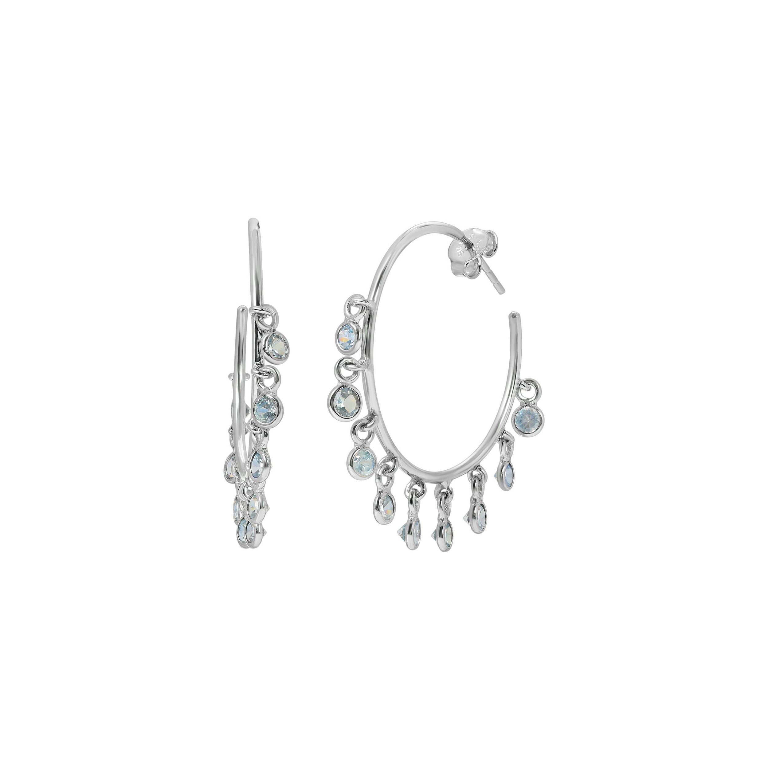 Sexy, stylish open hoop earrings in an ode to 1970's Boho Chic, surely the greatest period for hoop earrings. These stunning earrings feature a fringe of bezel set ice blue Sapphires.  These earrings have a total Sapphire weight of 2.10 Carats and