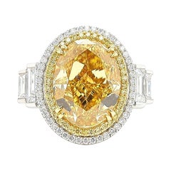Certified 10.06 Carat Yellow Diamond Three-Stone Engagement Ring