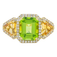 Bague à trois pierres en or 18 carats, péridot vert taille émeraude, citrine trillion et diamants
