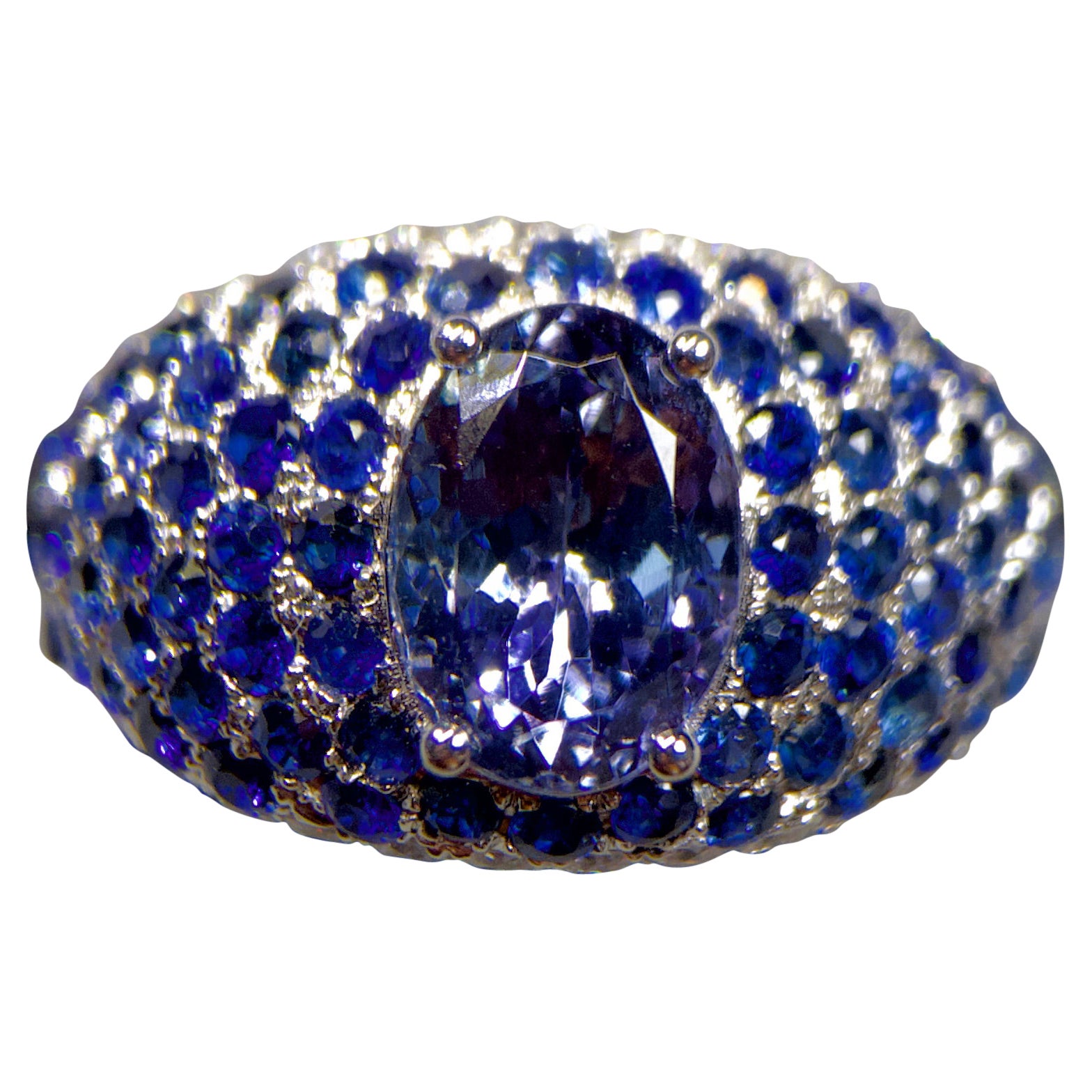 Bague en or blanc 18 carats avec tanzanite émeraude, saphir bleu et diamants