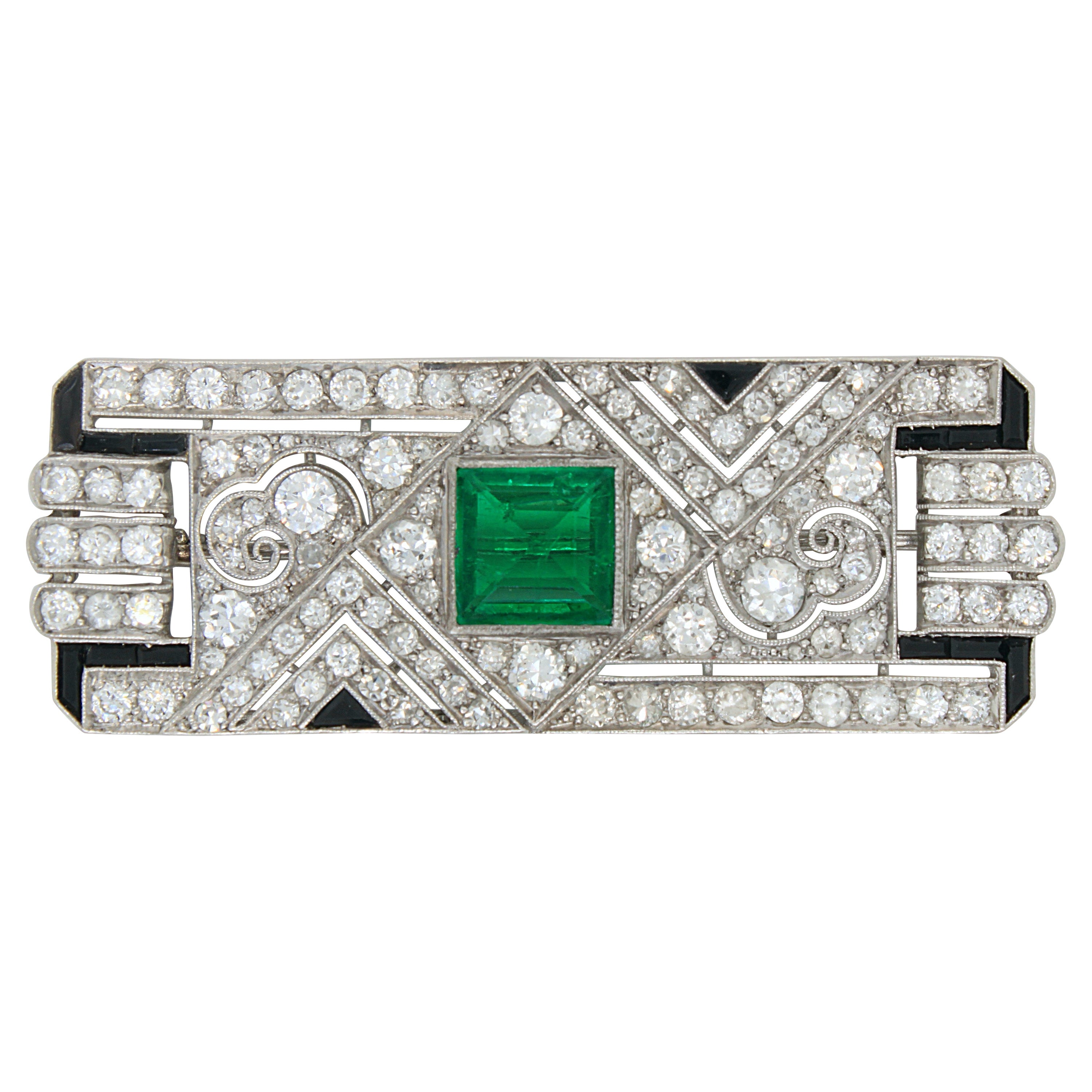 Columbian Emerald, Diamond and Onyx Art Deco Brooch, ca. 1920s For Sale