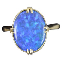 Stunning Quality 18 Carat Gold and Natural Black Opal Solitaire Ring