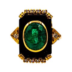Art Deco Style White Diamond Oval Cut Emerald Onyx Yellow Gold Cocktail Ring