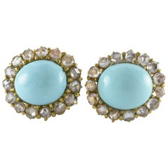 Clous d'oreilles victoriens en turquoise persane cabochon et halo de diamants 