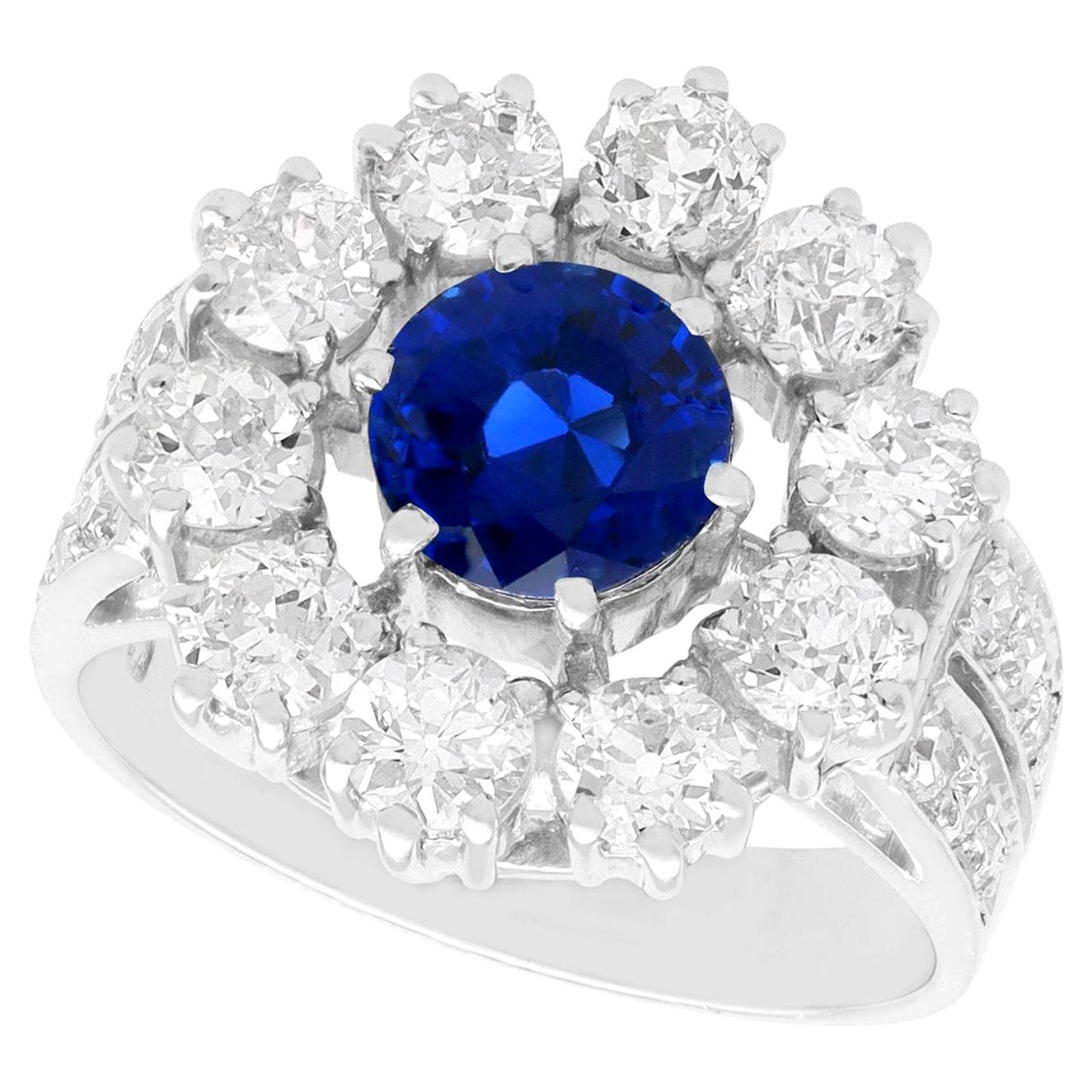 Vintage 1.66 Carat Sapphire and 1.90 Carat Diamond Platinum Cluster Ring For Sale