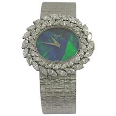 Piaget Lady's White Gold Opal Dial Double Diamond Bezel Wristwatch