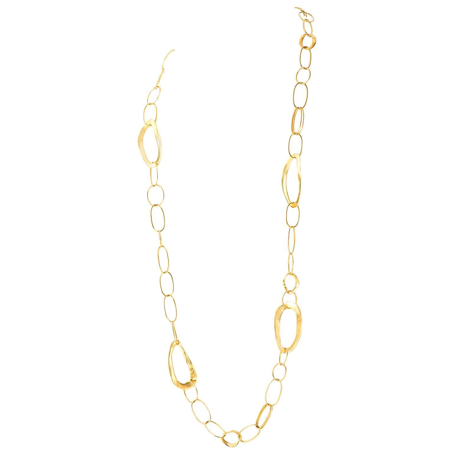 Contemporary, 18k, by Ippolita, New York, New York.  This striking 40-inch-long chain necklace personifies Ippolita’s trademark essence of modern, sculptural cool. The organically chic look is composed of heavy wire ovals interspersed with thick