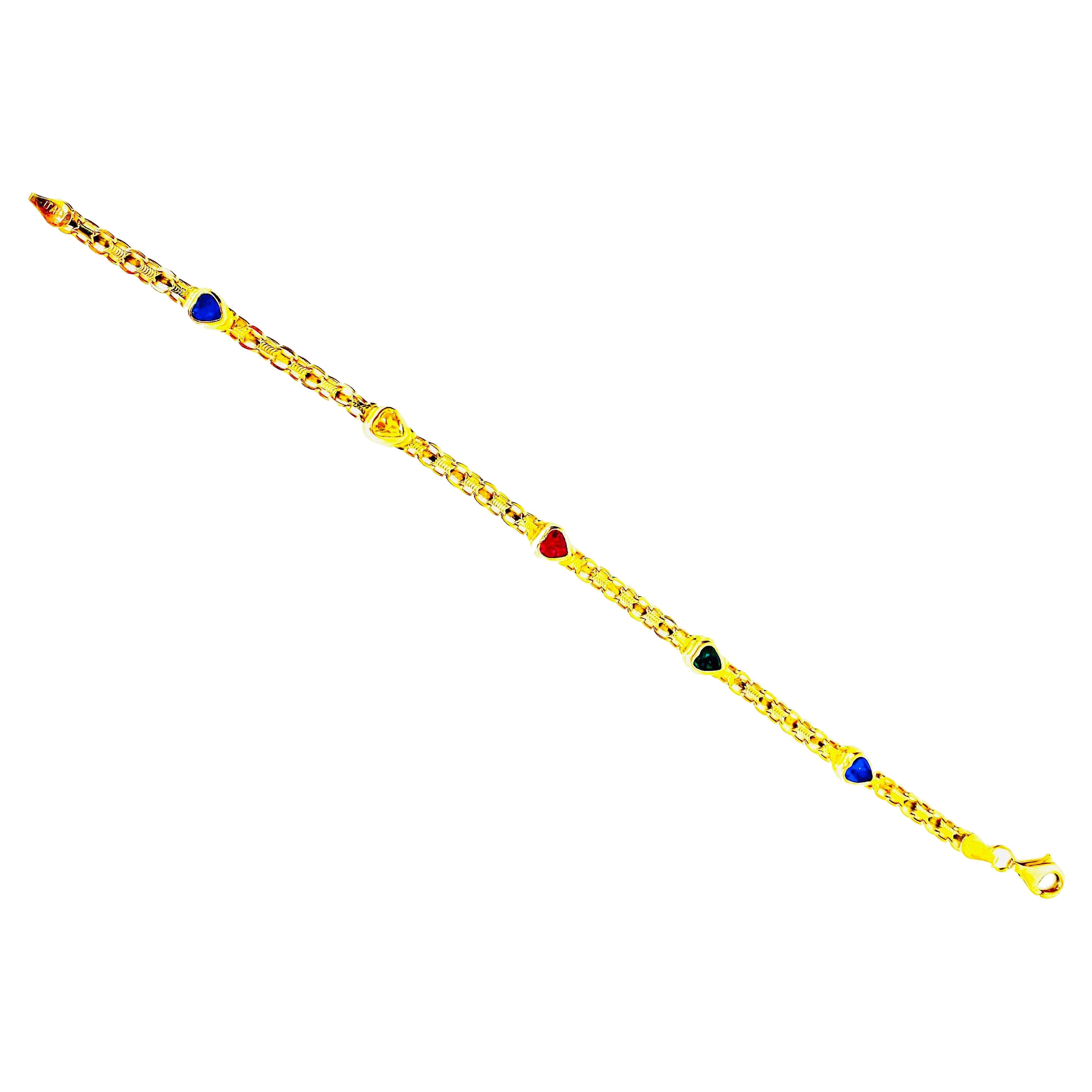 Bracelet vintage en forme de coeur avec pierres précieuses multicolores en or 14k. Le bracelet mesure 6 mm de large et 7 pouces de long. Le bracelet pèse 6,3 grammes d'or massif 14k.
