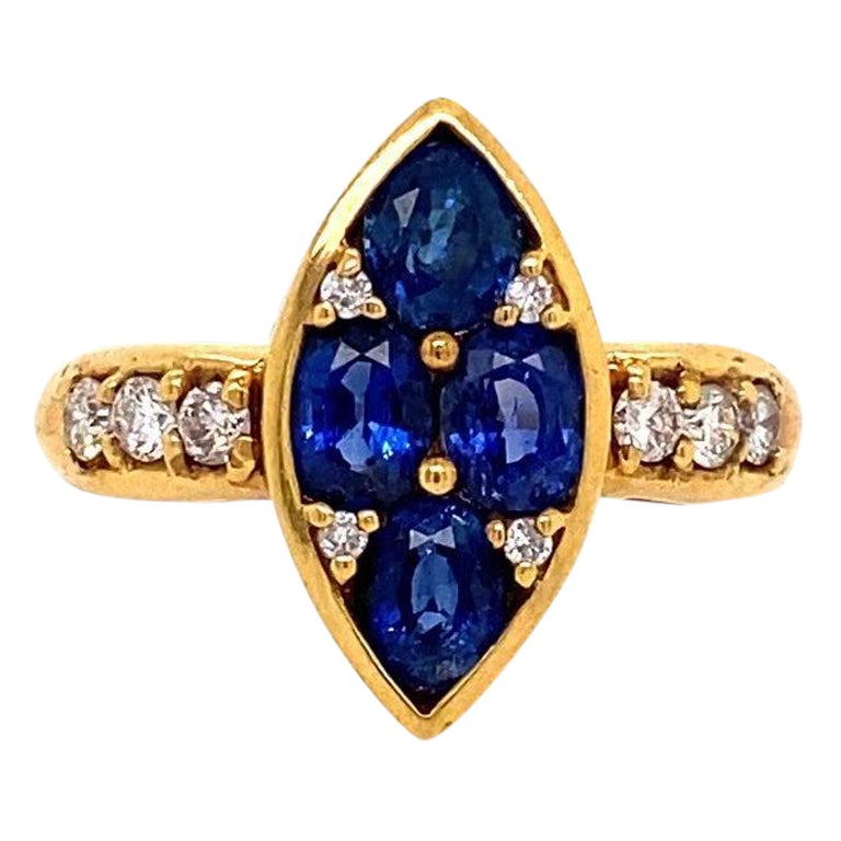 Blue Sapphire Ring with Diamonds and Gold For Sale
