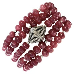 Bracelet multibrins en rubis et diamants