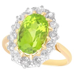 Antique 4.67 Carat Peridot and 0.89ct Diamond Yellow Gold Cluster Ring