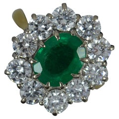 Impressive Emerald and 2.00ct Diamond 18ct Gold Cluster Ring