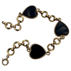 Mid-Century Modern Black Onyx Heart Bracelet 14 Karat Gold Vintage