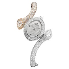 Reloj de oro rosa y blanco con diamantes