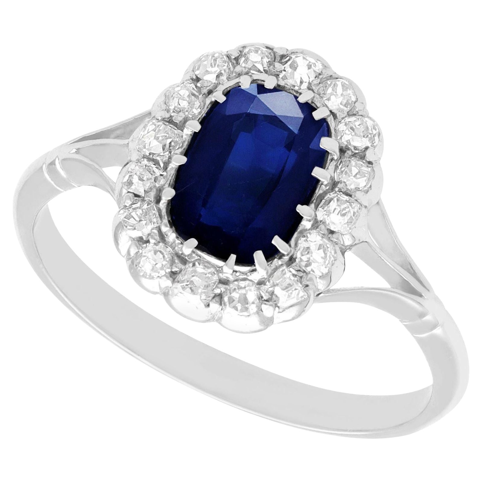 Antique 1.55 Carat Sapphire and Diamond White Gold Cluster Ring For Sale