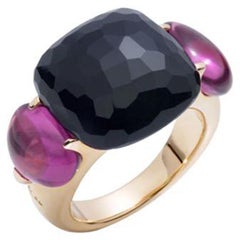 Used Pomellato Capri Ring in 18 Karat Rose Gold with Onyx and Red Tourmaline