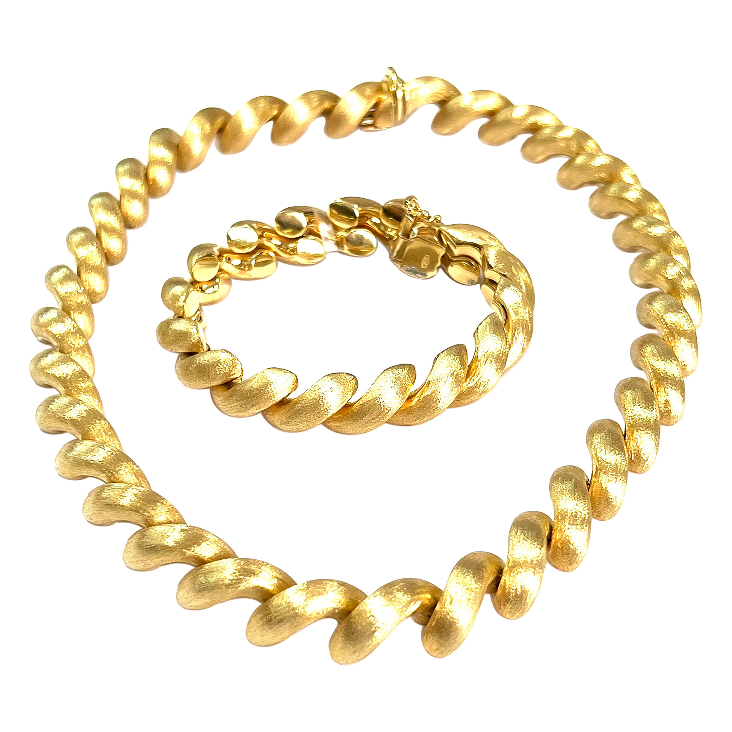 Set aus Halskette und Armband aus 18 Karat Satin-Gold