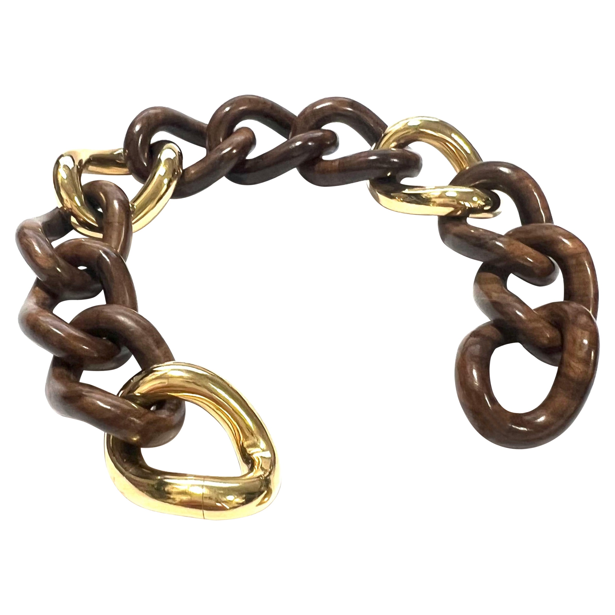 18 Karat Yellow Gold and Palissander Groumette Link Bracelet For Sale