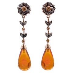 Boucles d'oreilles pendantes en argent et or rose 14 carats avec topaze et diamants