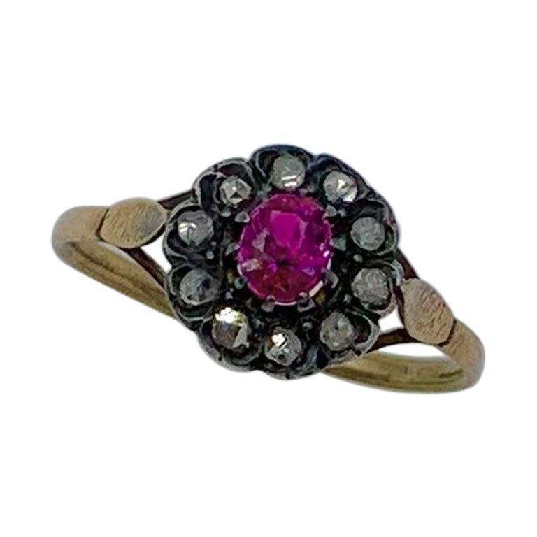 Bague de fiançailles ancienne en or 18 carats avec rubis de style géorgien et halo de diamants taille rose