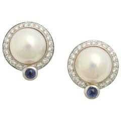 1980s Pearl Cabochon Sapphire Accents Diamond Platinum Earclips