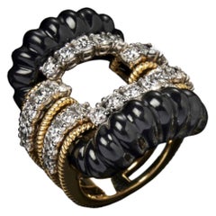 18 Karat Yellow and White Gold, Onyx and Diamond Ring