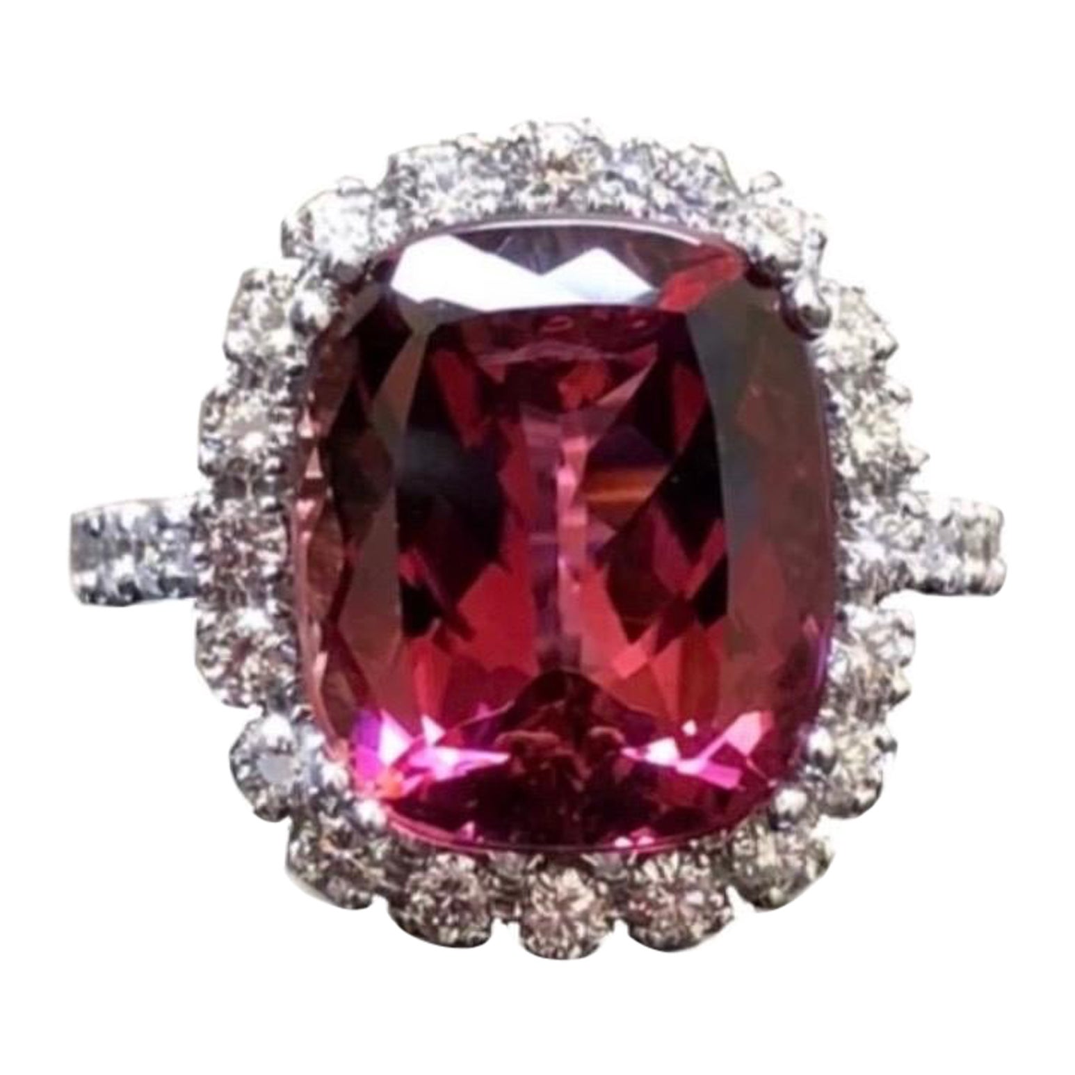 DeKara Designs Collection

Metal- 18K White Gold, .750.

Stones- Cushion Pinkish Red Tourmaline 8.40 Carats, 32 Round Diamonds, F-G Color VS1-VS2 Clarity, 1.20 Carats.

Size- Ring is a 6 1/2. FREE SIZING!!!!

A Breathtaking Luxurious 18K White Gold
