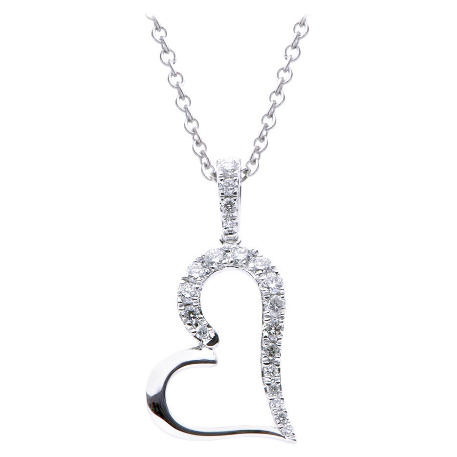 Collier en or blanc 14 carats avec cœur suspendu et diamants