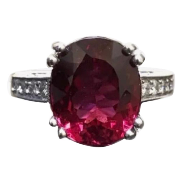 Art Deco Hand Engraved Platinum Pave Diamond Oval Rubelite Engagement Ring For Sale